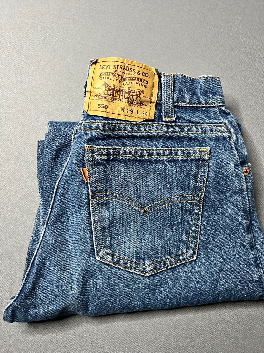 Levi's Straight Fit Men's Jeans - Blue Denim with Tan Patch